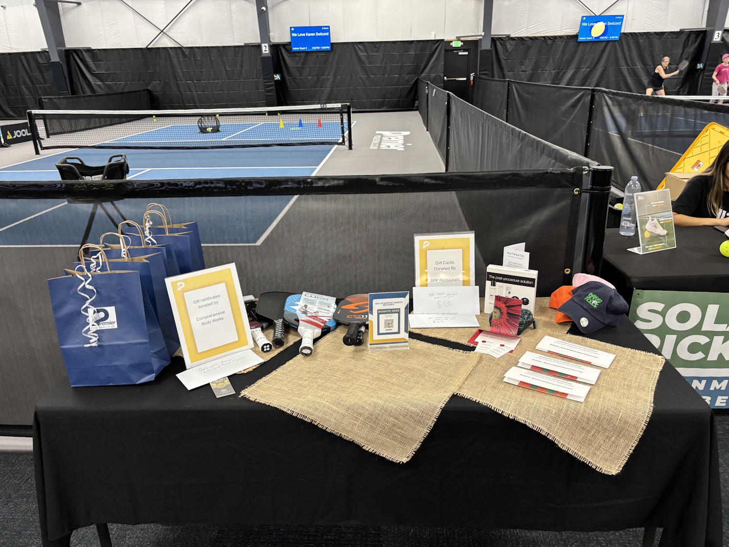 Premier Pickleball team gifts and swag table